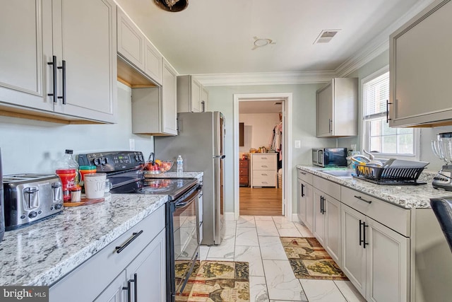 9444 Lafayette Ave, Manassas, VA 20109 - kitchen with electric range, light marble finish flooring, crown molding, a sink, and light stone counters