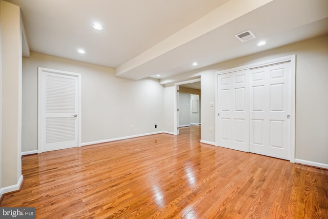 9127 Friars Rd, Bethesda, MD 20817 - finished basement featuring light wood finished floors, baseboards, and recessed lighting
