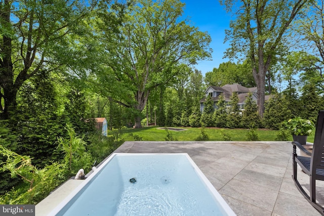 9850 Jerry Ln, Vienna, VA 22180 - view of pool with a lawn and a jacuzzi