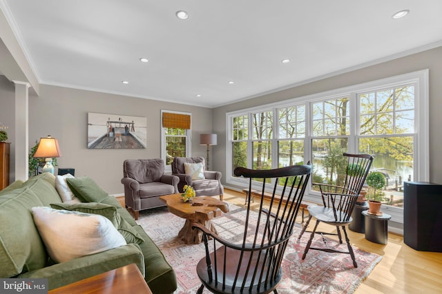 735 Dividing Rd, Severna Park, MD 21146 - living room featuring recessed lighting, ornamental molding, and light wood-style flooring