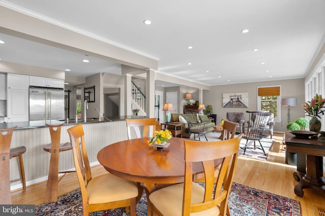 735 Dividing Rd, Severna Park, MD 21146 - dining room with stairway, light wood-style floors, baseboards, recessed lighting, and ornamental molding