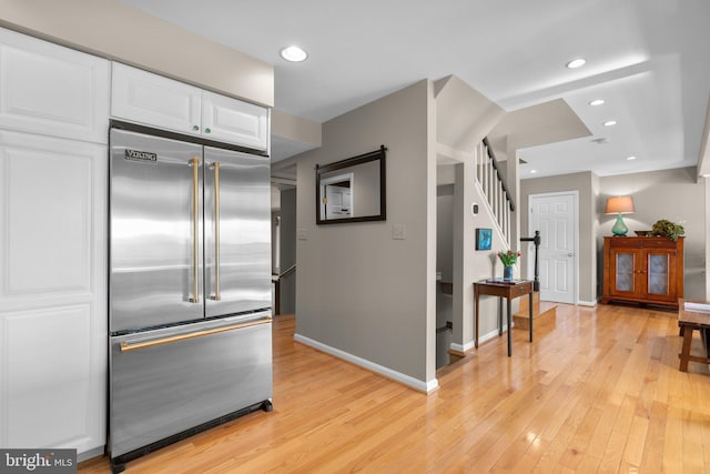 735 Dividing Rd, Severna Park, MD 21146 - kitchen with recessed lighting, light wood-style flooring, built in fridge, white cabinets, and baseboards