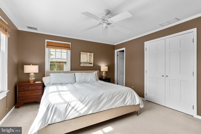 735 Dividing Rd, Severna Park, MD 21146 - bedroom featuring a closet, baseboards, ornamental molding, and light carpet