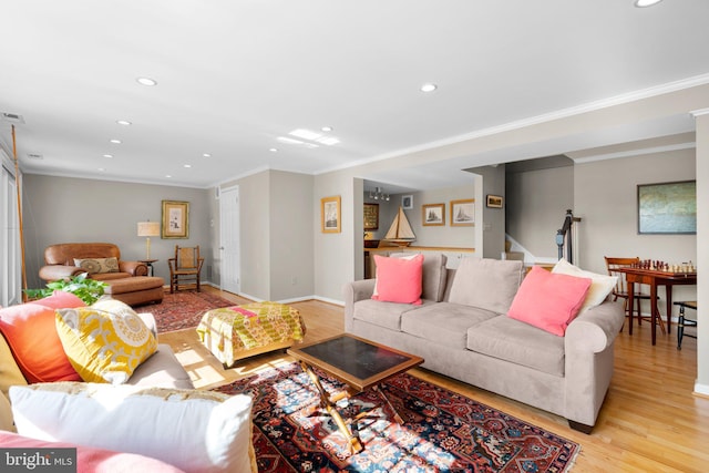 735 Dividing Rd, Severna Park, MD 21146 - living area featuring ornamental molding, recessed lighting, light wood finished floors, and stairs