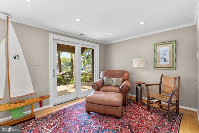 735 Dividing Rd, Severna Park, MD 21146 - sitting room with recessed lighting, visible vents, baseboards, ornamental molding, and wood finished floors