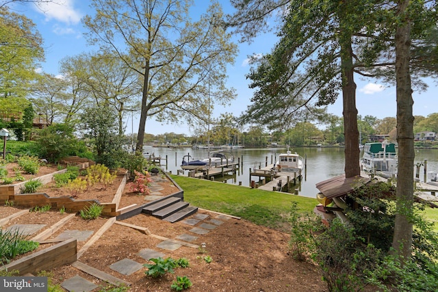 735 Dividing Rd, Severna Park, MD 21146 - dock area featuring boat lift, a yard, and a water view