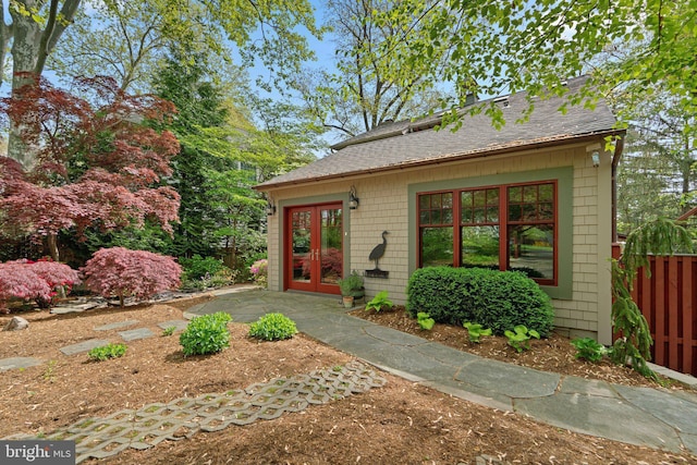 735 Dividing Rd, Severna Park, MD 21146 - exterior space featuring fence, french doors, and roof with shingles