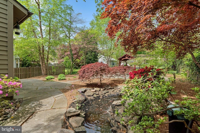 735 Dividing Rd, Severna Park, MD 21146 - view of yard featuring fence and a patio area