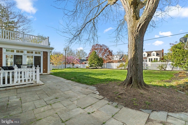 65 W Green St, Westminster, MD 21157 - view of patio featuring a residential view, a fenced backyard, and a balcony