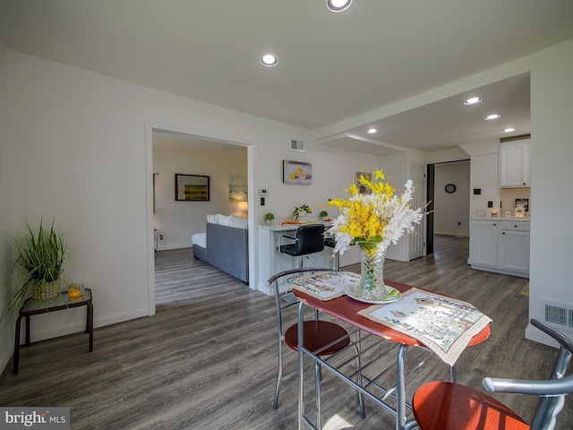 112 Jackson Ave, New Castle, DE 19720 - dining space with baseboards, visible vents, dark wood-type flooring, and recessed lighting