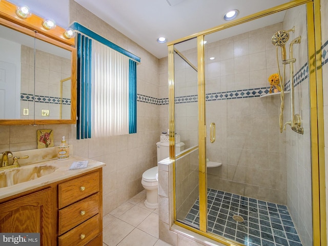 112 Jackson Ave, New Castle, DE 19720 - bathroom featuring tile patterned flooring, tile walls, toilet, vanity, and a stall shower