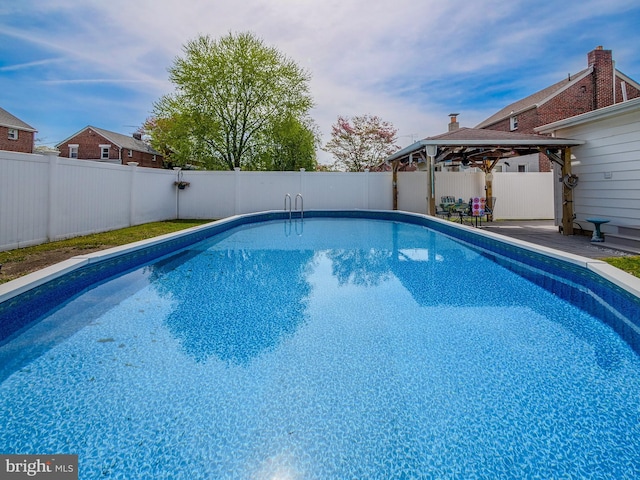 112 Jackson Ave, New Castle, DE 19720 - view of swimming pool featuring a gazebo, a fenced backyard, and a fenced in pool