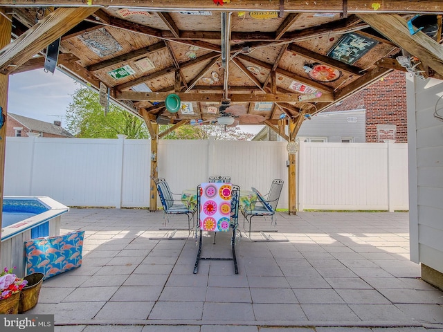 112 Jackson Ave, New Castle, DE 19720 - view of patio with outdoor dining space, a gazebo, and a fenced backyard