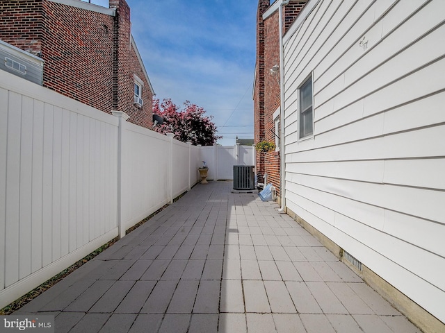 112 Jackson Ave, New Castle, DE 19720 - view of patio featuring a fenced backyard and central AC unit