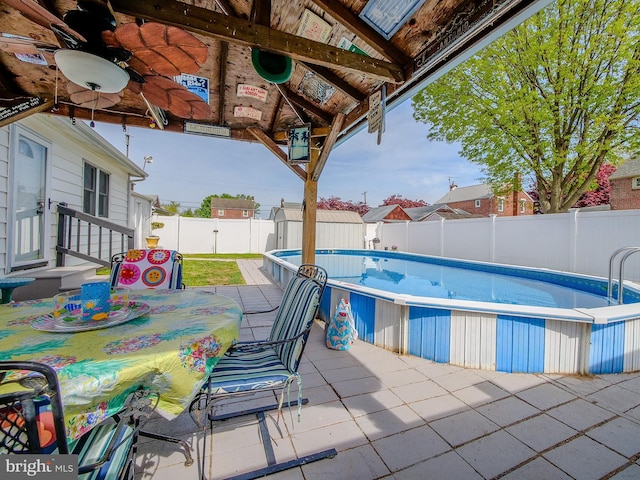 112 Jackson Ave, New Castle, DE 19720 - view of pool featuring a fenced backyard, a ceiling fan, a fenced in pool, and a patio area