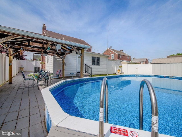 112 Jackson Ave, New Castle, DE 19720 - view of pool with a gazebo, a fenced backyard, a ceiling fan, and a fenced in pool