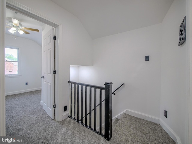 112 Jackson Ave, New Castle, DE 19720 - interior space with baseboards, a ceiling fan, carpet flooring, and vaulted ceiling