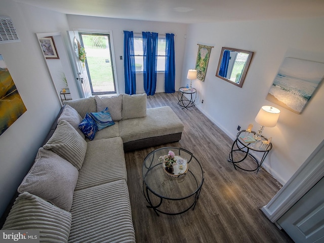 112 Jackson Ave, New Castle, DE 19720 - living room with baseboards, visible vents, and wood finished floors