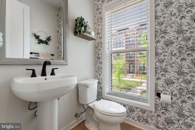 4605 Quinns Mill Way, Chantilly, VA 20151 - bathroom featuring baseboards, wood finished floors, toilet, and wallpapered walls