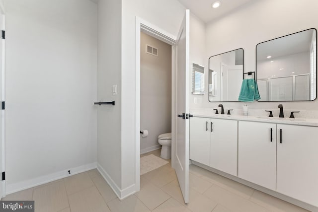 4605 Quinns Mill Way, Chantilly, VA 20151 - full bath with visible vents, a sink, a stall shower, and toilet
