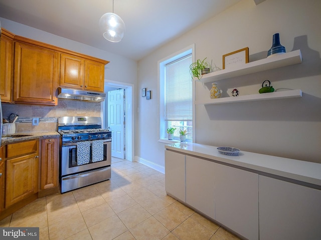 2905 Memphis St, Philadelphia, PA 19134 - kitchen featuring open shelves, brown cabinetry, stainless steel gas range, and under cabinet range hood