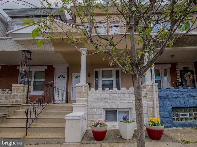2905 Memphis St, Philadelphia, PA 19134 - multi unit property with stone siding, covered porch, and stucco siding