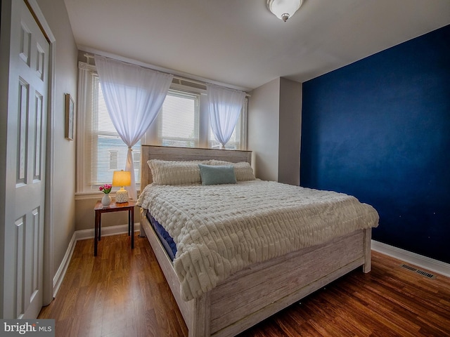 2905 Memphis St, Philadelphia, PA 19134 - bedroom featuring baseboards, wood finished floors, and visible vents