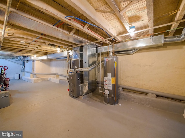 2905 Memphis St, Philadelphia, PA 19134 - unfinished basement featuring gas water heater and heating unit