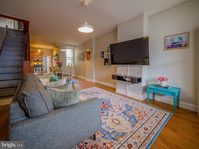 2905 Memphis St, Philadelphia, PA 19134 - living room with stairway, baseboards, and wood finished floors