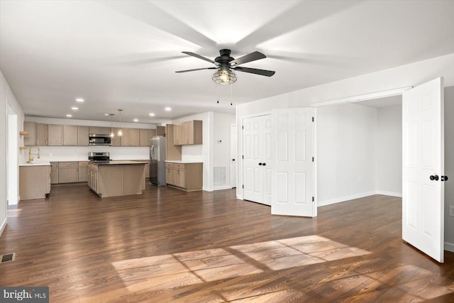 unfurnished living room with visible vents, baseboards, a ceiling fan, and recessed lighting