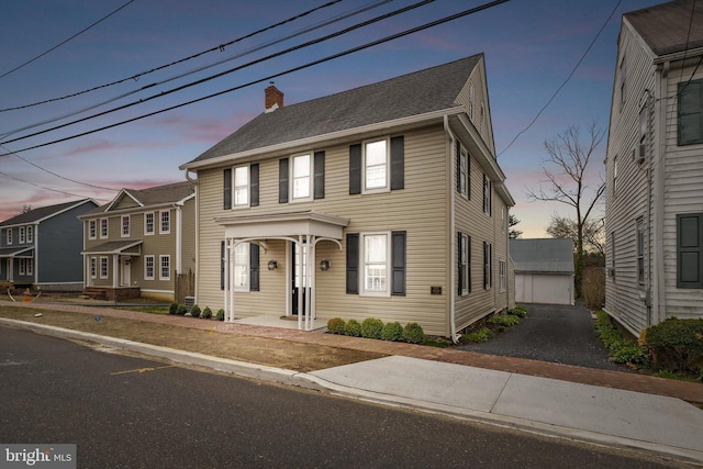 442 Ellisdale Rd, Crosswicks, NJ 08515 - colonial-style house featuring an outdoor structure, a shingled roof, and a chimney