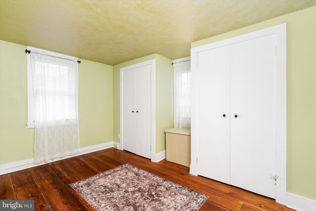 442 Ellisdale Rd, Crosswicks, NJ 08515 - unfurnished bedroom with a closet, wood-type flooring, and baseboards