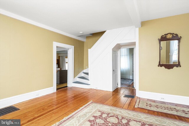 442 Ellisdale Rd, Crosswicks, NJ 08515 - spare room featuring visible vents, baseboards, wood-type flooring, and stairs
