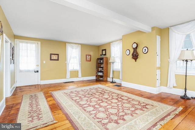 442 Ellisdale Rd, Crosswicks, NJ 08515 - foyer entrance featuring visible vents, baseboards, hardwood / wood-style floors, and beam ceiling