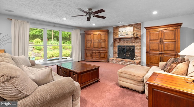 116 Amesbury Ct, Severna Park, MD 21146 - living area featuring light colored carpet, a ceiling fan, a fireplace, recessed lighting, and a textured ceiling