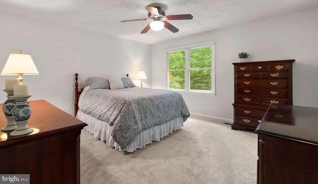 116 Amesbury Ct, Severna Park, MD 21146 - bedroom with a textured ceiling, light colored carpet, baseboards, and ceiling fan
