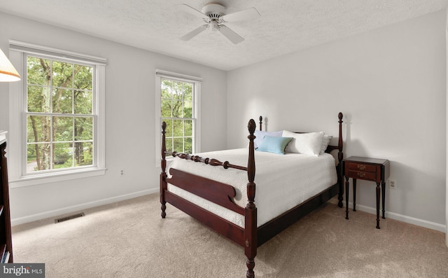 116 Amesbury Ct, Severna Park, MD 21146 - bedroom with a textured ceiling, light colored carpet, baseboards, and ceiling fan