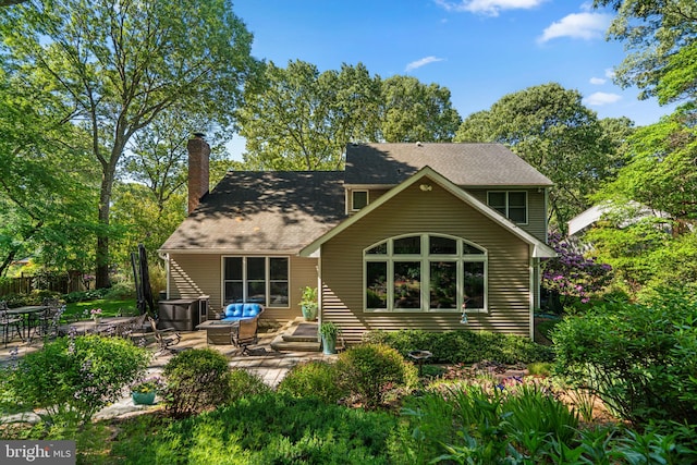 116 Amesbury Ct, Severna Park, MD 21146 - back of house featuring a chimney and a patio area
