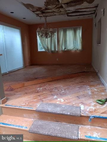 empty room featuring wood-type flooring