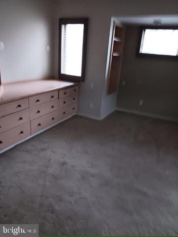 unfurnished bedroom with carpet flooring