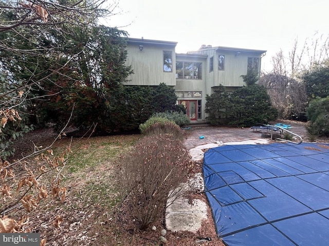 back of property with a patio area