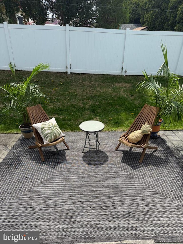 view of patio / terrace with fence
