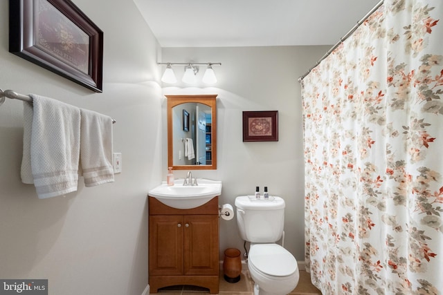 15014 Plastron Ct, Woodbridge, VA 22193 - full bathroom with toilet, tile patterned flooring, a shower with shower curtain, vanity, and rail lighting