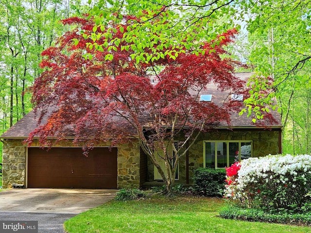 1326 Jones Station Rd, Arnold, MD 21012 - view of front facade with concrete driveway, roof with shingles, stone siding, and a garage
