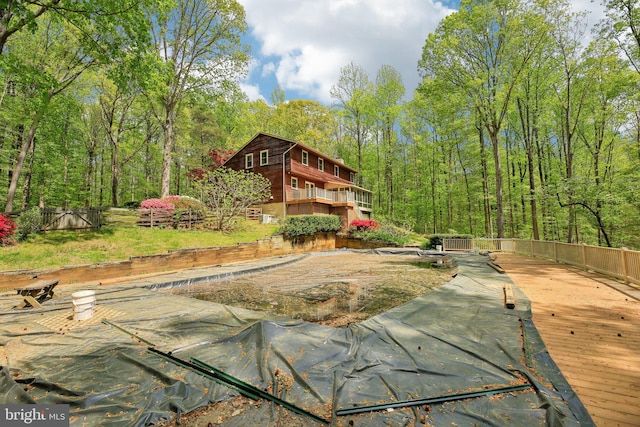 1326 Jones Station Rd, Arnold, MD 21012 - exterior space with a wooden deck and a wooded view