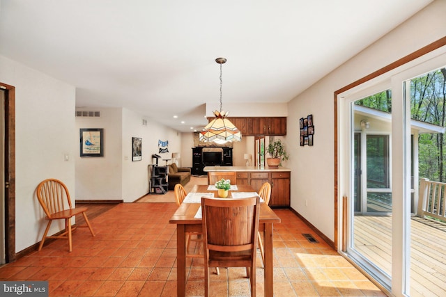 1326 Jones Station Rd, Arnold, MD 21012 - dining space with visible vents, baseboards, and plenty of natural light