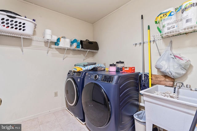 10257 Back Creek Valley Rd, Hedgesville, WV 25427 - laundry area with a sink, baseboards, independent washer and dryer, laundry area, and light tile patterned floors