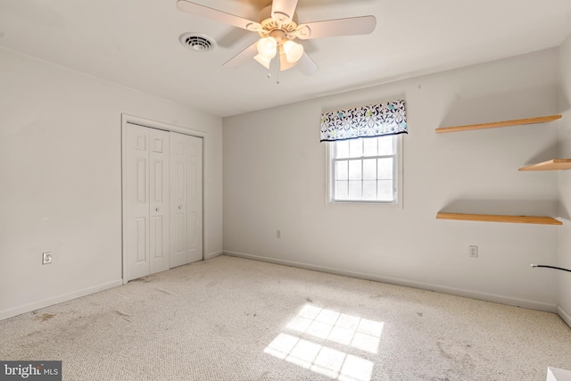 10257 Back Creek Valley Rd, Hedgesville, WV 25427 - unfurnished bedroom with carpet floors, a closet, visible vents, and baseboards