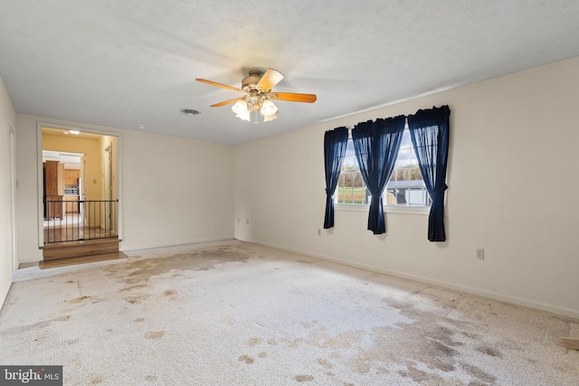 10257 Back Creek Valley Rd, Hedgesville, WV 25427 - carpeted spare room with ceiling fan, baseboards, and visible vents
