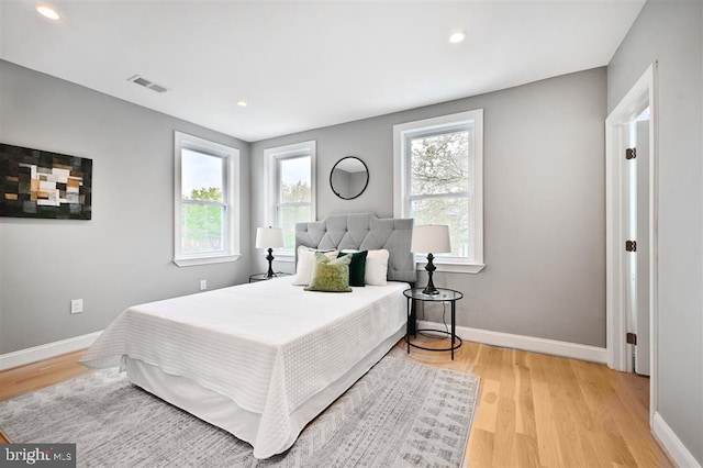512 Peabody St NW, Washington, DC 20011 - bedroom featuring visible vents, baseboards, recessed lighting, and light wood-style floors